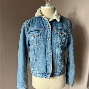 Levi’s Sherpa lined Jean jacket. Marked M, fits like a S